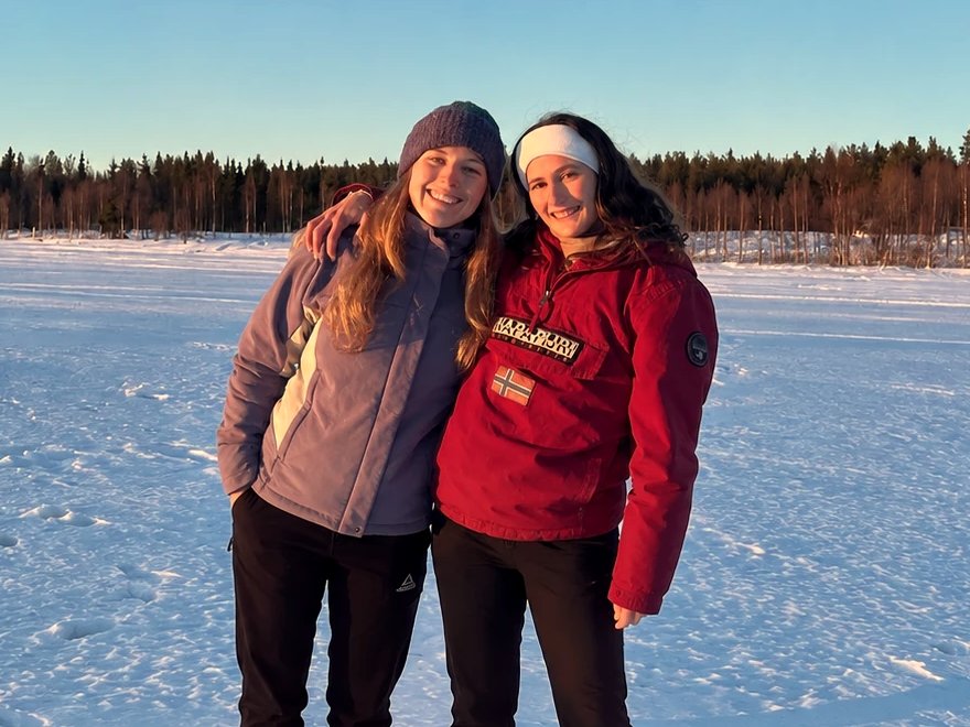 Sophie and Katie, the founders of Milestone Vault, smiling together outdoors